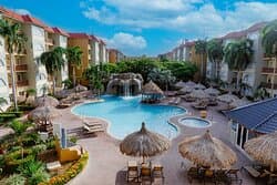 Relax in our waterfall pool and unwind in the soothing whirlpool—perfect for a refreshing escape.