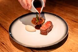 Angus Entrecote - Tartelette made of onion, carrot, celery and green aspergus - beef jus