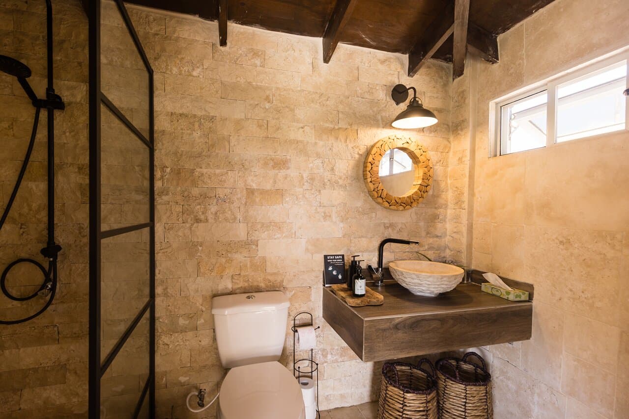 Massage Therapy Aruba - Open Air Gazebo - Modern bathroom facility with shower.