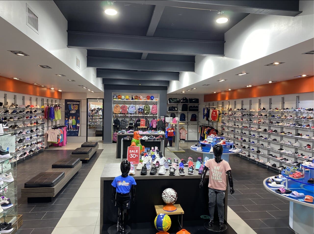 We offer sneakers, sandals, and clothing for kids.