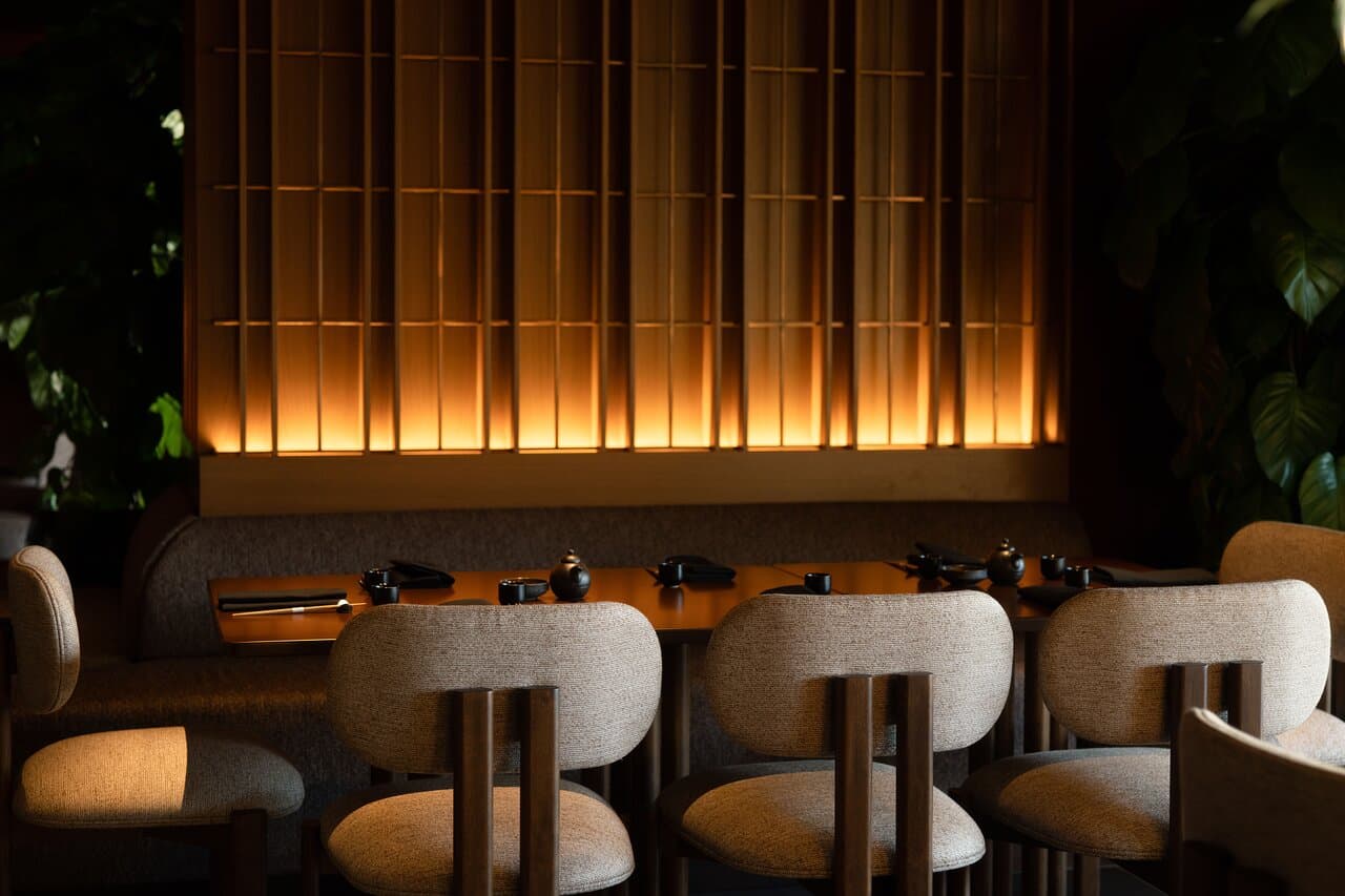 Warm lighting and thoughtful design set the stage for an intimate sushi experience.