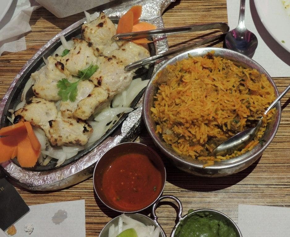 grilled fish marinated in milk and basmati rice with mutton