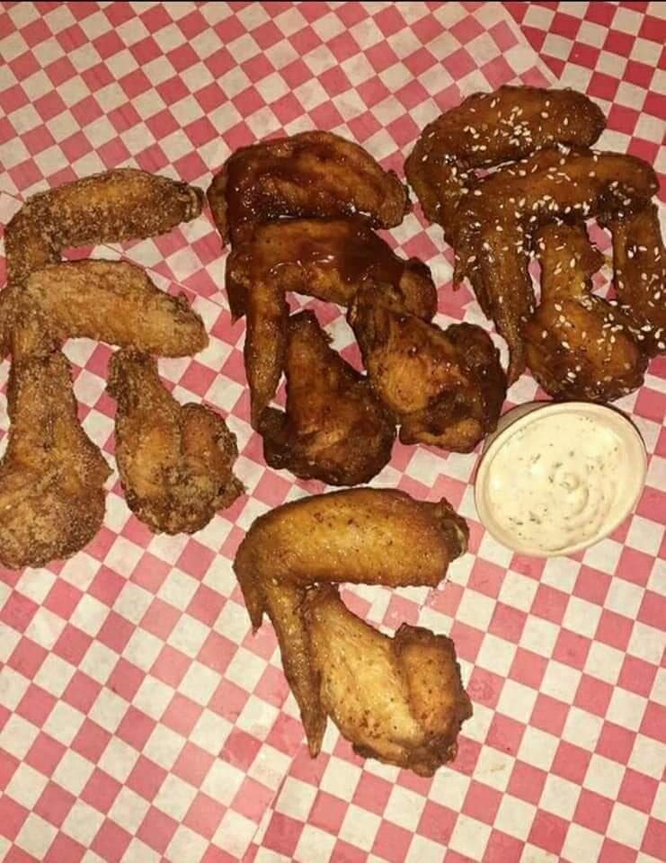 Well it speaks for itself! The infamous chicken wings, sometimes we have 4 different varieties and all of them delicious! To find out more check our Facebook!
