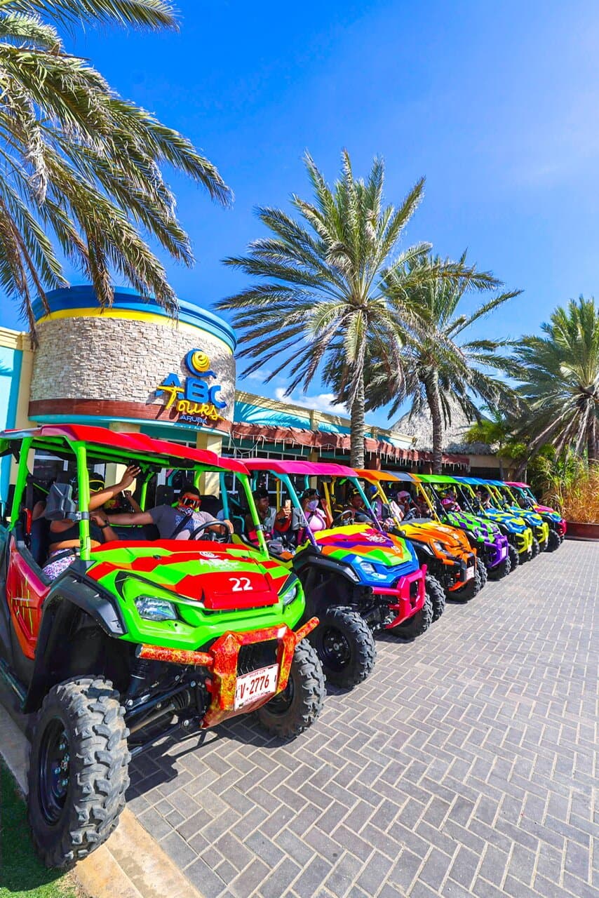🌈 Rev those engines! Our vibrant fleet of UTVs is lined up and ready to roll. With every color under the Aruban sun, these cool rides are your chariots to adventure. Hop in, and let's explore ABC-style! 🚀🏝️ #ColorfulAdventure #ArubaUTV"