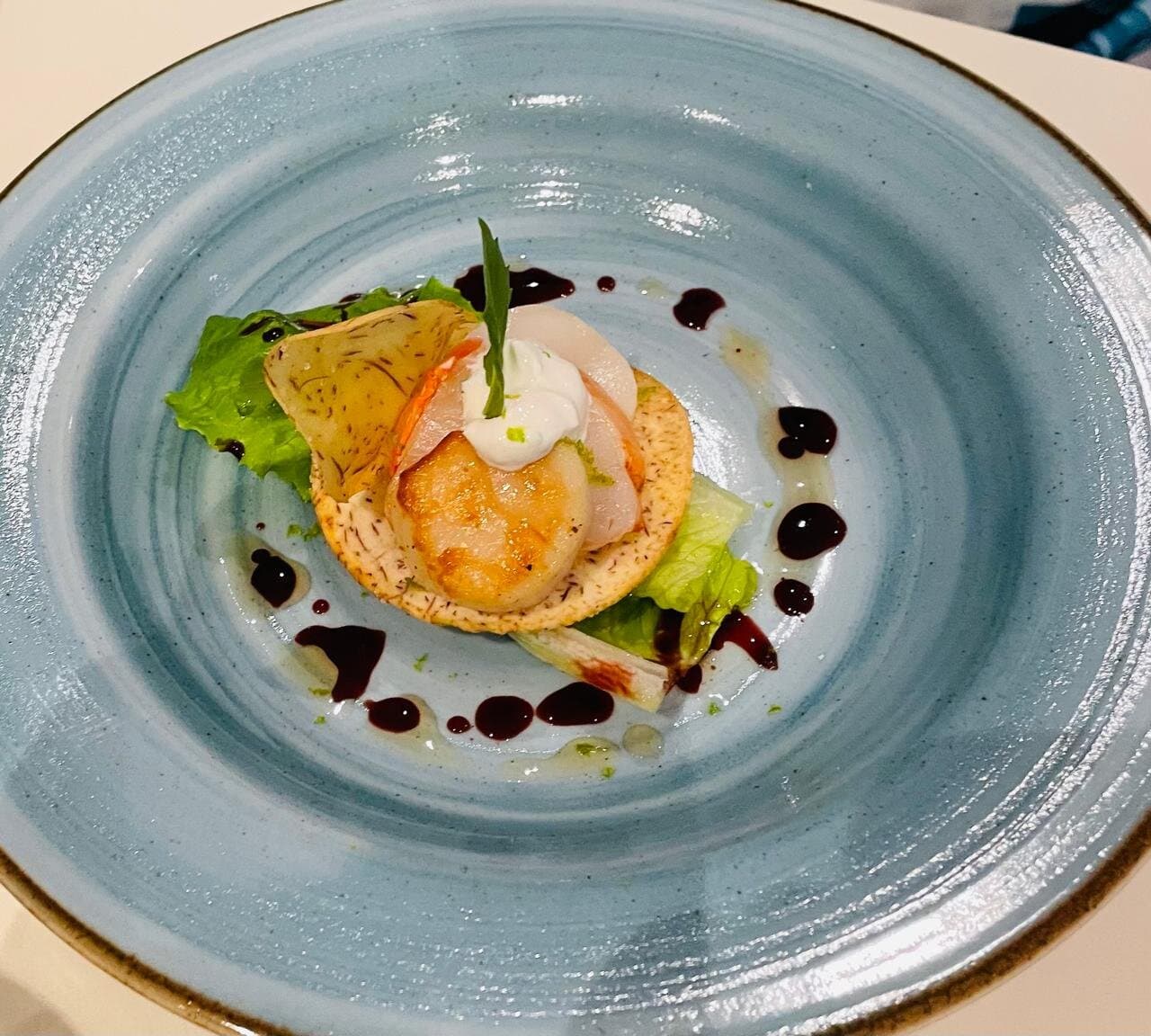 Appetizer: lobster tail on tarot root with fennel salad