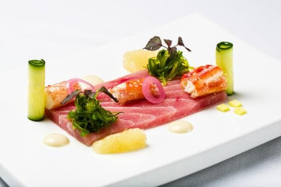 Sashimi of tuna with king crab, grapefruit, cucumber, avocado, seaweed, oriental mayonnaise