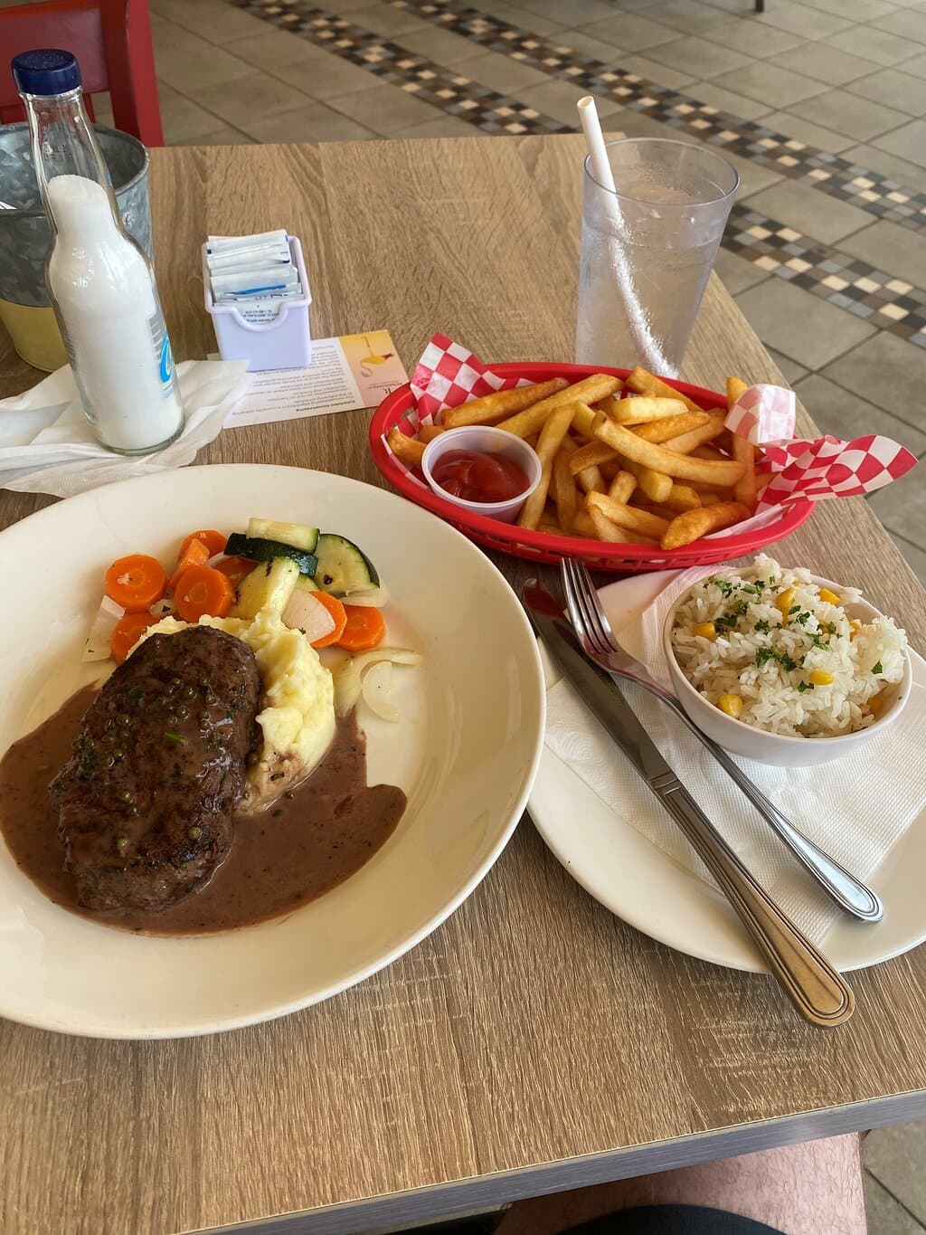 8oz Tenderlion, corned rice and fries