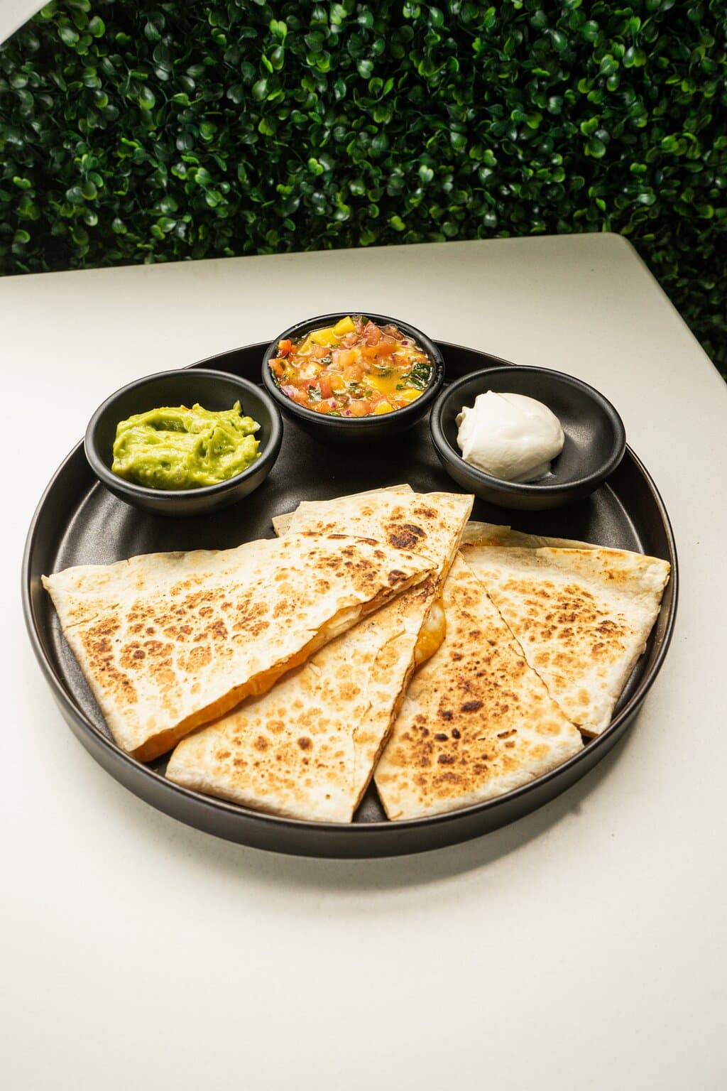 Quesadilla - served with mango salsa, sour cream and guacamole