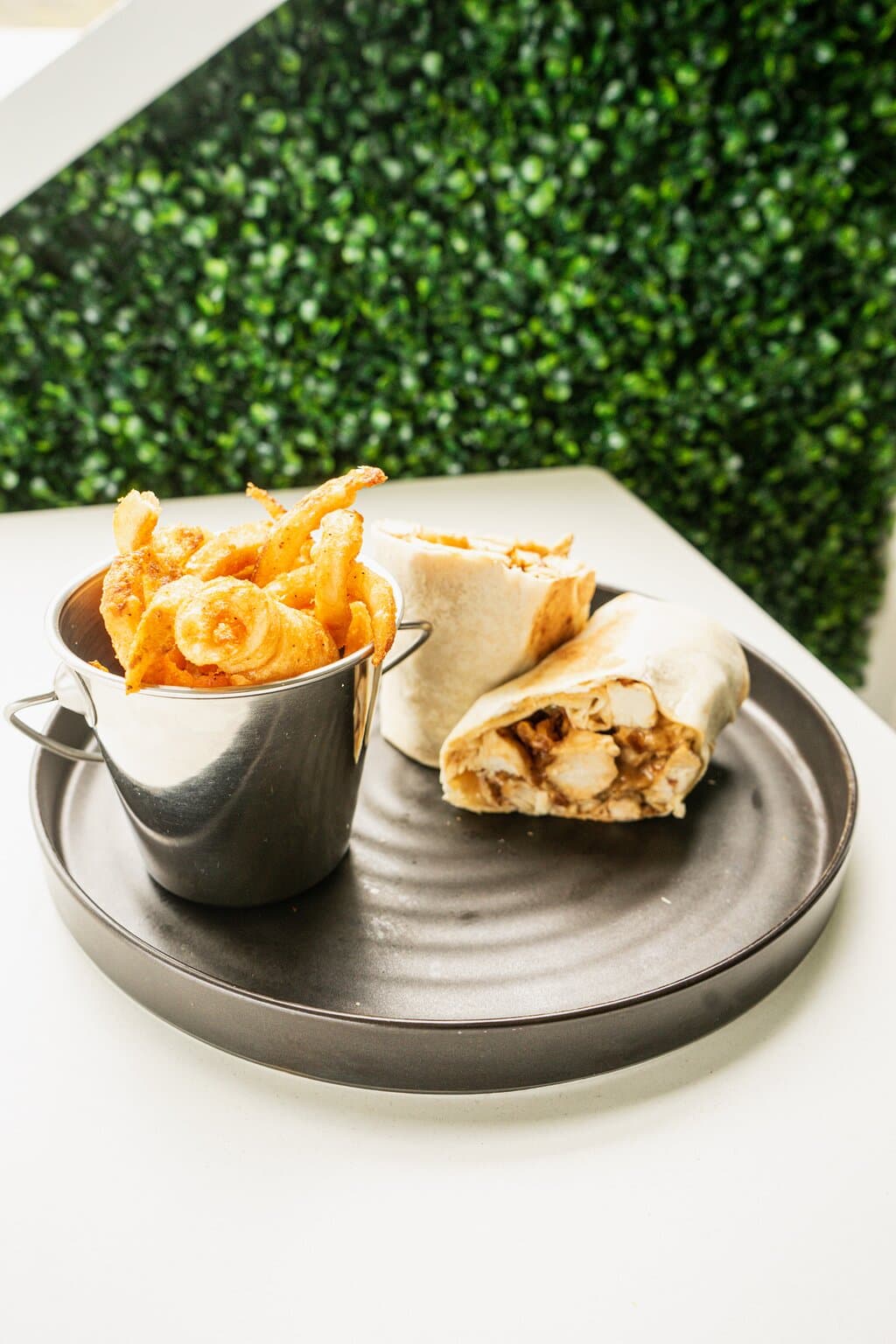 White BBQ Wrap - Grilled chicken, white BBQ sauce, jalapeño, crispy onions and gouda cheese