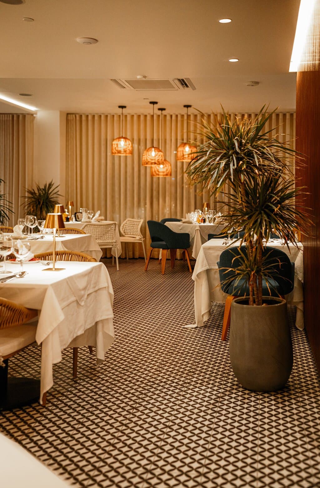 Where natural accent, soft lighting, and a calming ambience create the perfect setting for a luxurious dining experience.