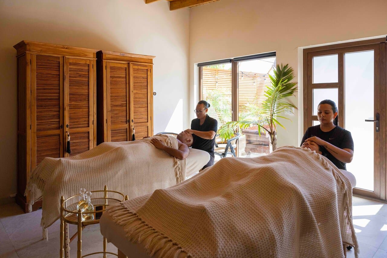 Mario and Nicoll couples massage in our indoor treatment room.