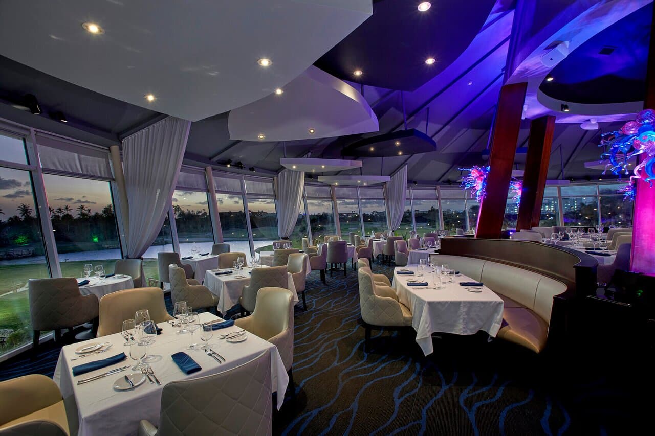 Windows on Aruba offers an exceptional dining experience with stunning 180° views of the golf course and the ocean beyond.