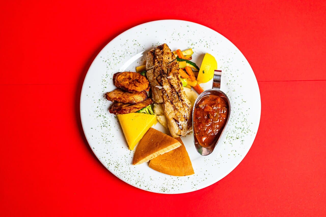 Fresh Catch of the day with the traditional side local dishes
