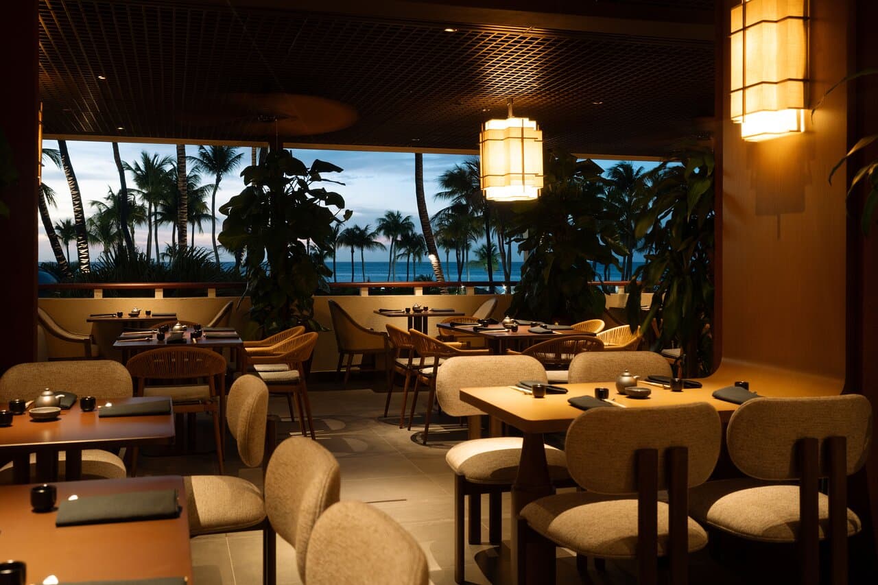 Warm evening ambiance at ShinSen with sunset over the Caribbean Sea.