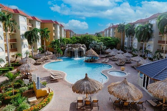 Relax in our waterfall pool and unwind in the soothing whirlpool—perfect for a refreshing escape.
